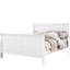 Grand lit blanc avec une finition et un design fonctionnel au look classique