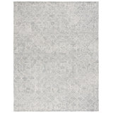 Linsly Geometric Area Rug in Light Green/Ivory