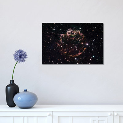 A Detailed View Of The Tattered Remains Of A Supernova Explosion by Stocktrek Images - Wrapped Canvas Print