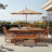 Averyann 59.8''-78.3'' W Solid Wood Extendable Outdoor Dining Table with Umbrella Hole