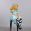 Statue Alice assise