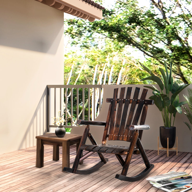 Chaise berçante en bois brun