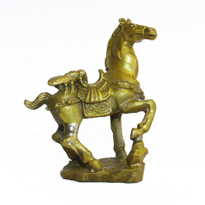 Figurine singe sur cheval