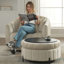Fauteuil demi-tonneau surdimensionné pivotant à 360 ° avec capitonnage et oreillers