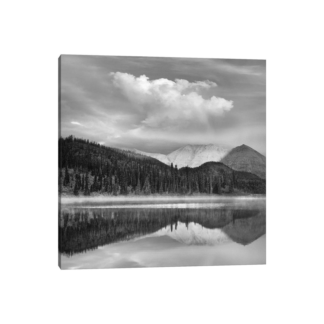 Mountain Reflected In Pond, Northern Rocky Mountain Provincial Park, British Columbia, Canada von Tim Fitzharris - Galle...