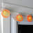 10 Battery Operated Orange Slice Summer LED String Lights - 4.5 ft Clear Wire