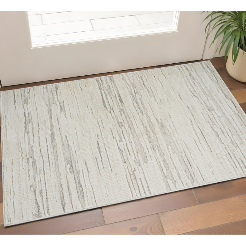2' X 5' Gray and Beige Geometric Distressed Area Rug