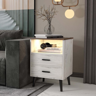 The SOBRO side table is a smart end table & night stand. It has various  features like cooler drawer, wireless charging, Bluetooth speakers, motion  sensor lighting, power ports, accent lighting etc. It's