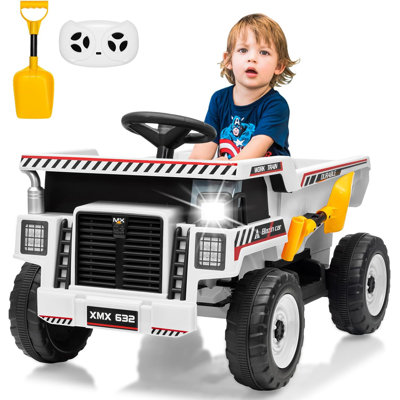 Les enfants de 12 V montent sur un camion à benne basculante avec un véhicule à benne basculante électrique pour les tout-petits.