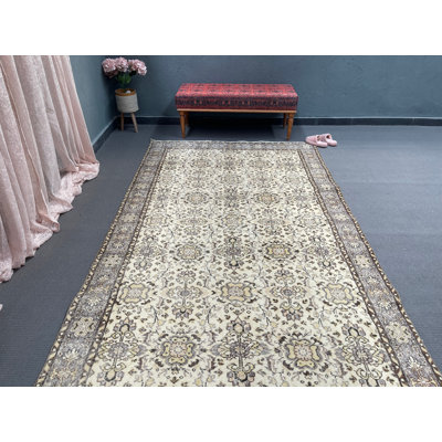 Tapis en laine beige 6,5 x 11,3 pi