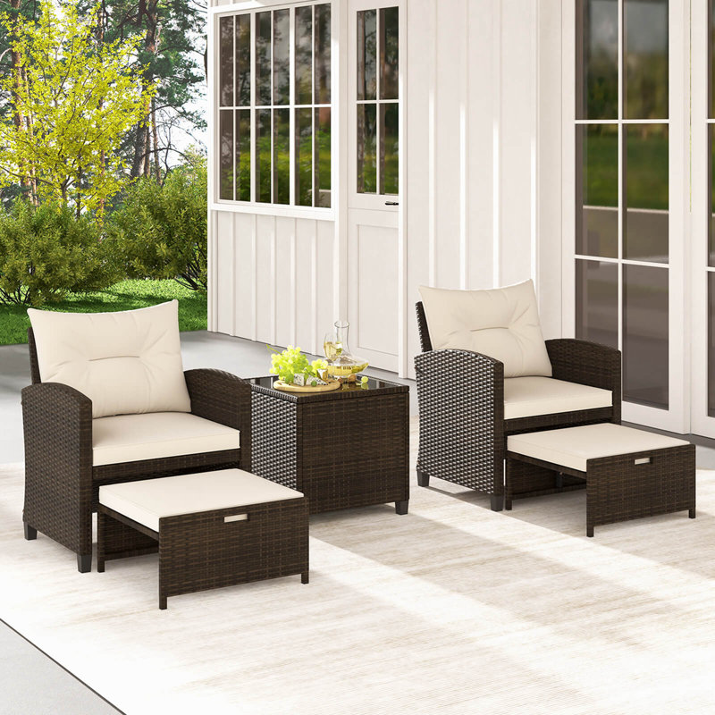 Winston Porter 5 Piece Patio Rattan Furniture With 2 Ottomans & Tempered Glass Coffee Table, Off White