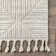 Kerry Textured Geometric Tasseled Area Rug