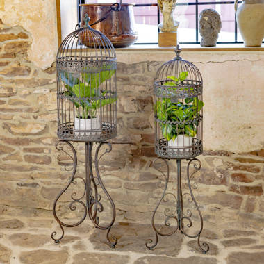 Lot - A LARGE VICTORIAN STYLE BRONZED WROUGHT IRON BIRD CAGE ON STAND,  MODERN