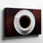 Toile vue de haut en bas d'une tasse d'art murale simple et élégante remplie de café brun foncé avec des bulles subtiles sur toile-207401974