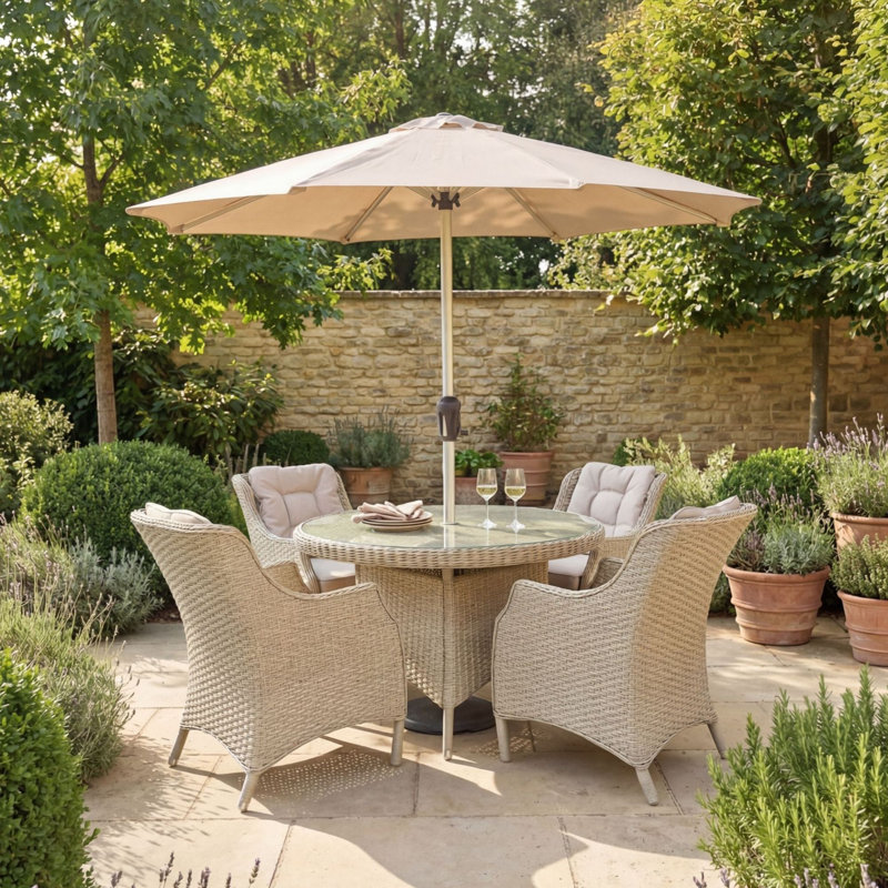 4 - Person Patio Dining Set with Round Table , Cushions Included