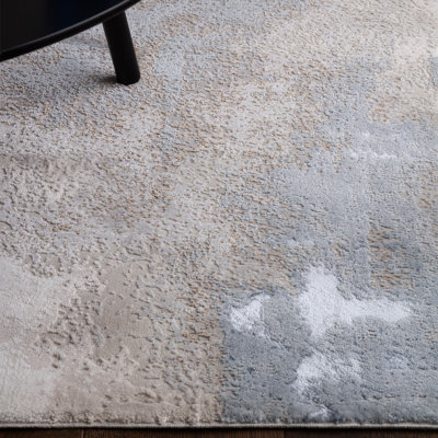 Caydren Abstract Blue/Beige Area Rug