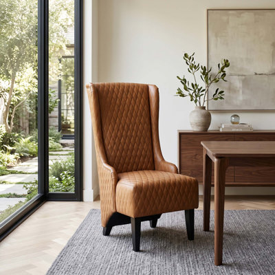 Fauteuil d'appoint moderne à oreilles en similicuir avec revêtement capitonné et pieds en bois massif