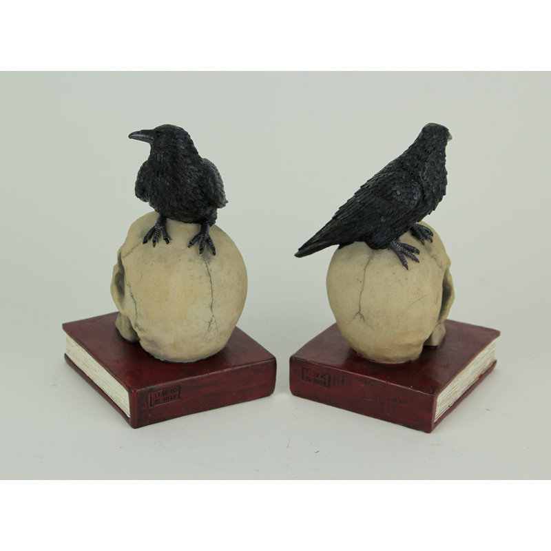 Gothic Evil Omen raven on skull resin decorative bookend set with black, beige and brown finish — 7 in. H x 4.5 in. L x 4 in. W