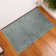 Spiceland Floral Polypropylene Area Rug in Solid Gray