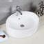 Lavabo de salle de bain circulaire en céramique avec trop-plein Brook