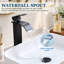 Robinet de lavabo à vasque cascade haut, en acier inoxydable noir mat, sans trop-plein et bonde escamotable.