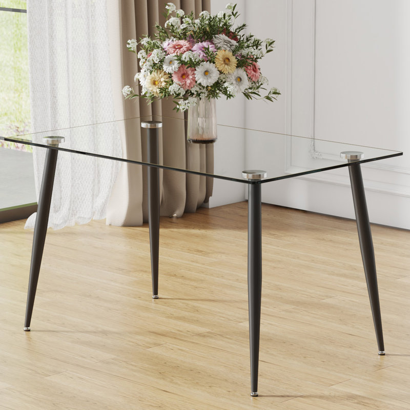 Table de salle à manger rectangulaire moderne en verre avec plateau trempé et pieds en métal noir, parfaite pour les petits et moyens espaces