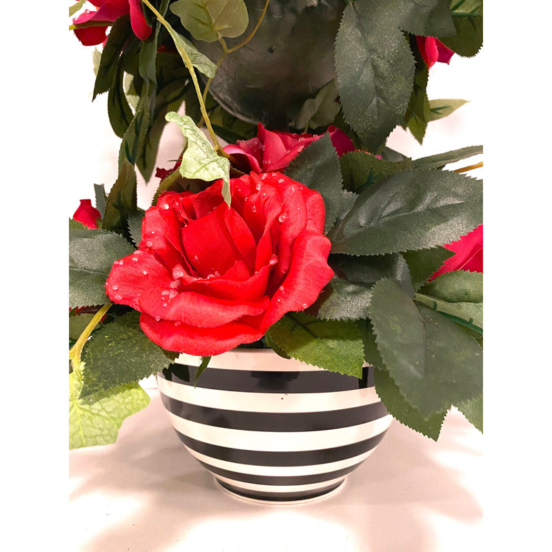 Arrangements floraux hautes roses en pot