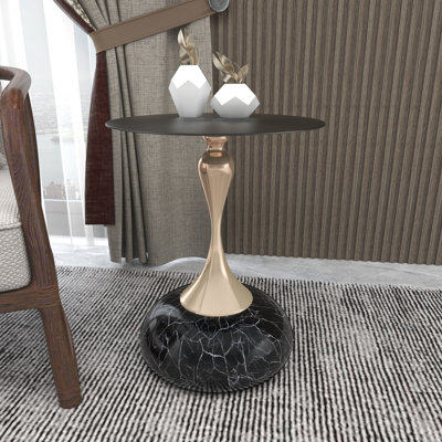 Table d'appoint ronde Damya, table de chevet en acier inoxydable noir avec plateau métallique brossé et pied central incurvé sculptural, finition thermolaquée pour salon, bureau et usage quotidien