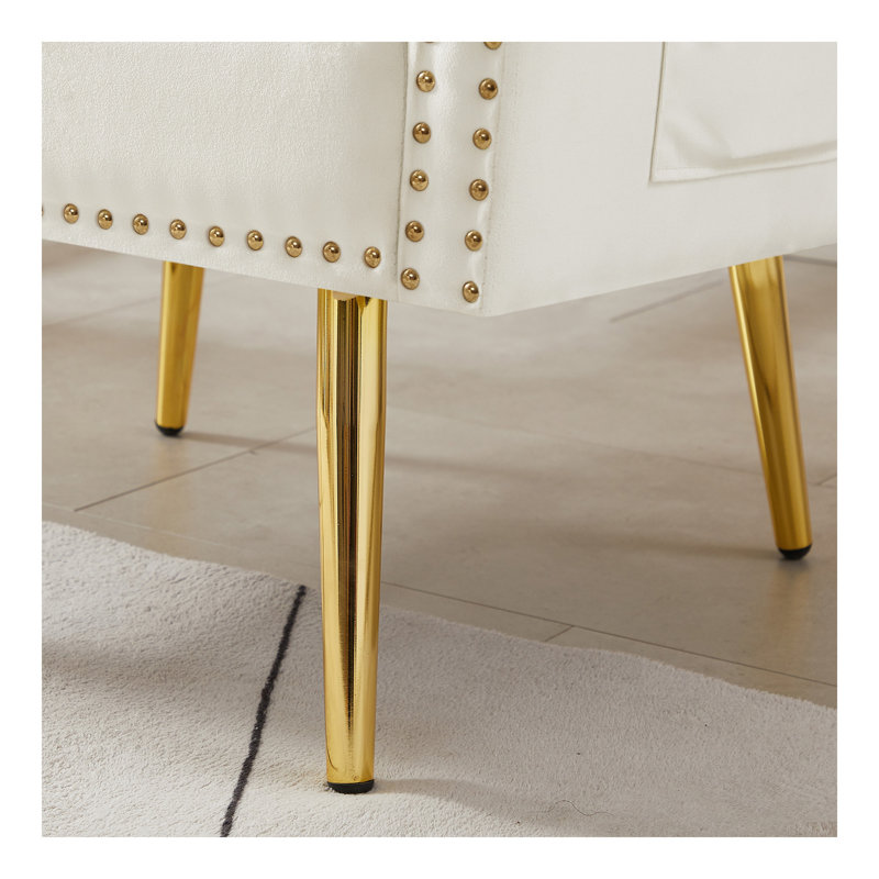 Fauteuil en velours blanc cassé avec pieds en métal
