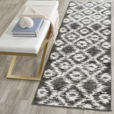 Mckee Geometric Area Rug