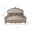 Grand lit plateforme tapissier capitonné
