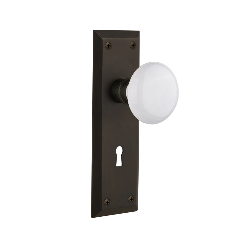 New York Plate with Decorative Keyhole and White Porcelain Door Knob, 2-3/4”, Oil-Rubbed Bronze