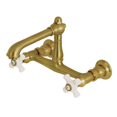 Kingston Brass English Country Two-Handle 2-Hole Wall Mount Bathroom Faucet