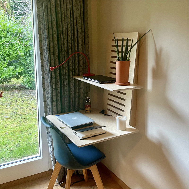 Bureau flottant à hauteur réglable