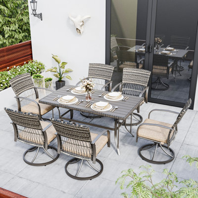 Ensemble de salle à manger 7 pièces en métal avec table rectangulaire et chaises pivotantes en rotin avec coussin beige