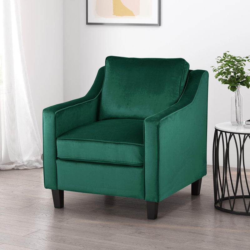 Fauteuil club en velours vert