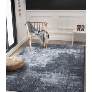 https://assets.wfcdn.com/im/39413163/resize-h310-w310%5Ecompr-r85/2284/228434856/priebe-abstract-machine-made-flatweave-polyester-area-rug-in-dark-gray.jpg