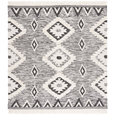 Alimatou Hand Knotted Wool/Cotton Southwestern Rug in Black/Ivory
