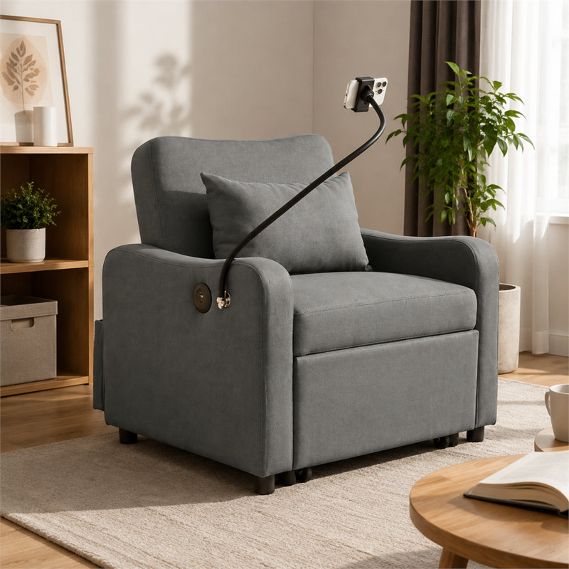 Canapé-lit convertible 3 en 1 gris foncé avec dossier réglable, support pour téléphone et port USB-C ; convient à divers petits appartements.