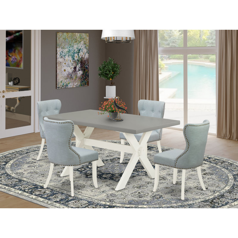 L'ensemble de mobilier de salle à manger 5 pièces comprend une table de salle à manger rectangulaire avec pieds en X et 4 chaises rembourrées en tissu bleu lin, lin brossé blanc