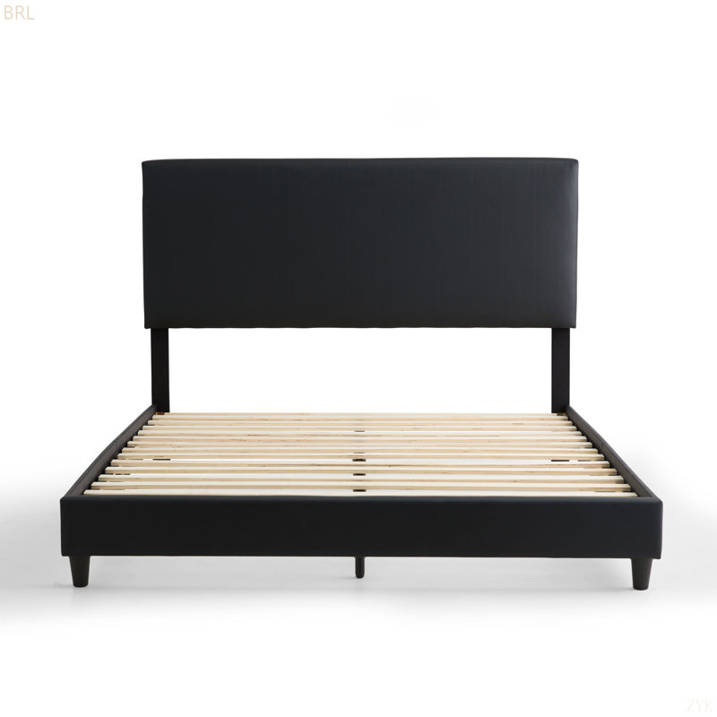 Lit plateforme tapissier en similicuir