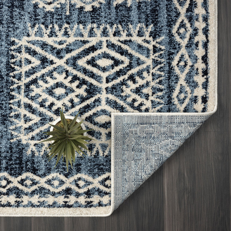 Tapis bleu abstrait en polypropylène tissé à la machine, Rectangle 6 pi 7 po x 9 pi 2 po