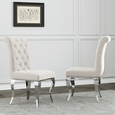 Chaises de salle à manger rembourrées en velours blanc avec pieds cabriole argentés Khenan
