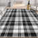 Tapis noir à tissage plat Kehr