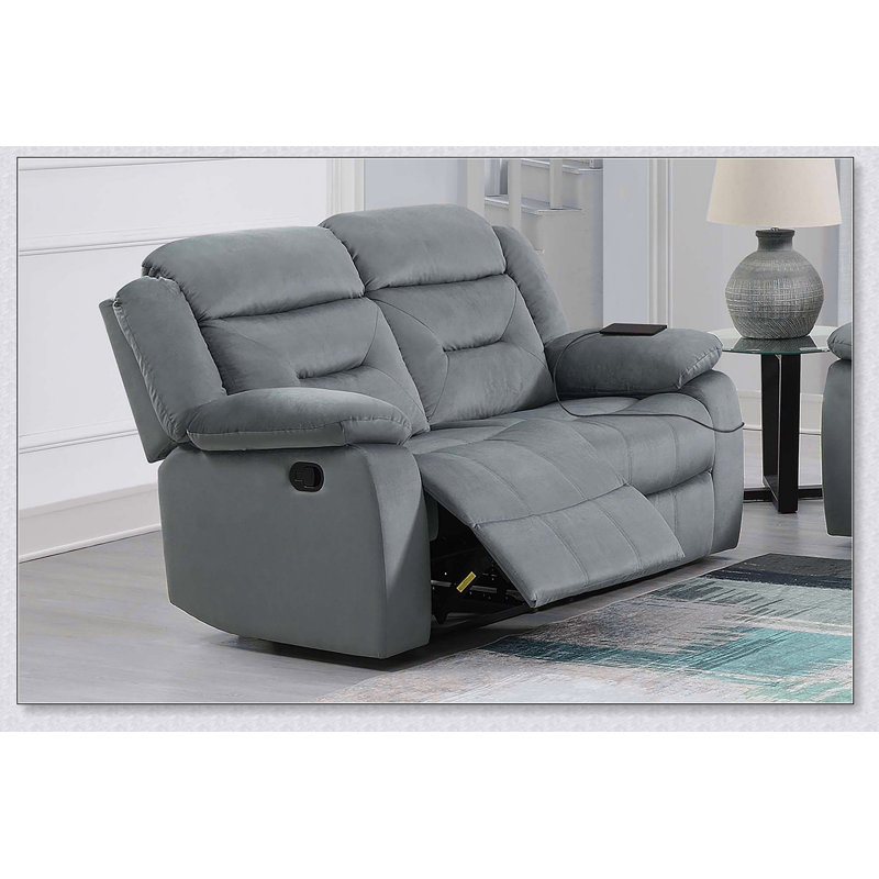 Canapé manuel deux places avec accoudoirs rembourrés, dossier moelleux, capitonnage horizontal, port USB et finition gris foncé pour salons modernes