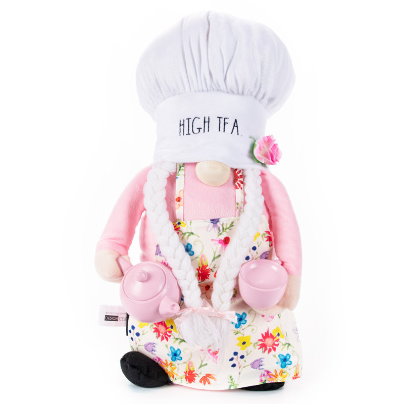 Gnome de printemps moelleux avec théière