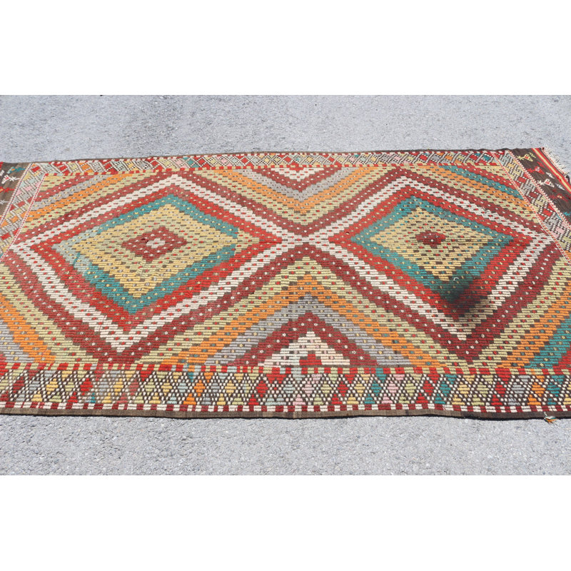 Tapis turc tissé à la main en motifs géométriques traditionnels, idéal pour la décoration de salon ou de chambre à coucher
