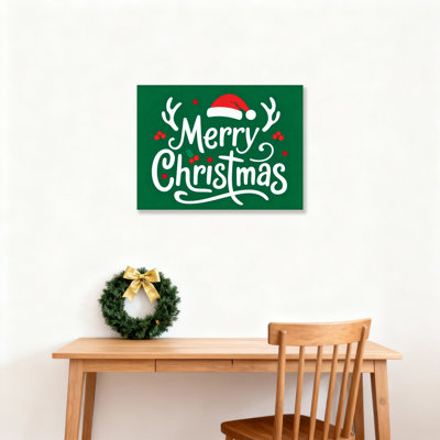 Joyeux Noël, chapeau de père Noël et bois de renne sur toile