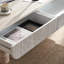 Table basse ovale avec tiroir cannelé et plateau en faux marbre - Mid-Century moderne
