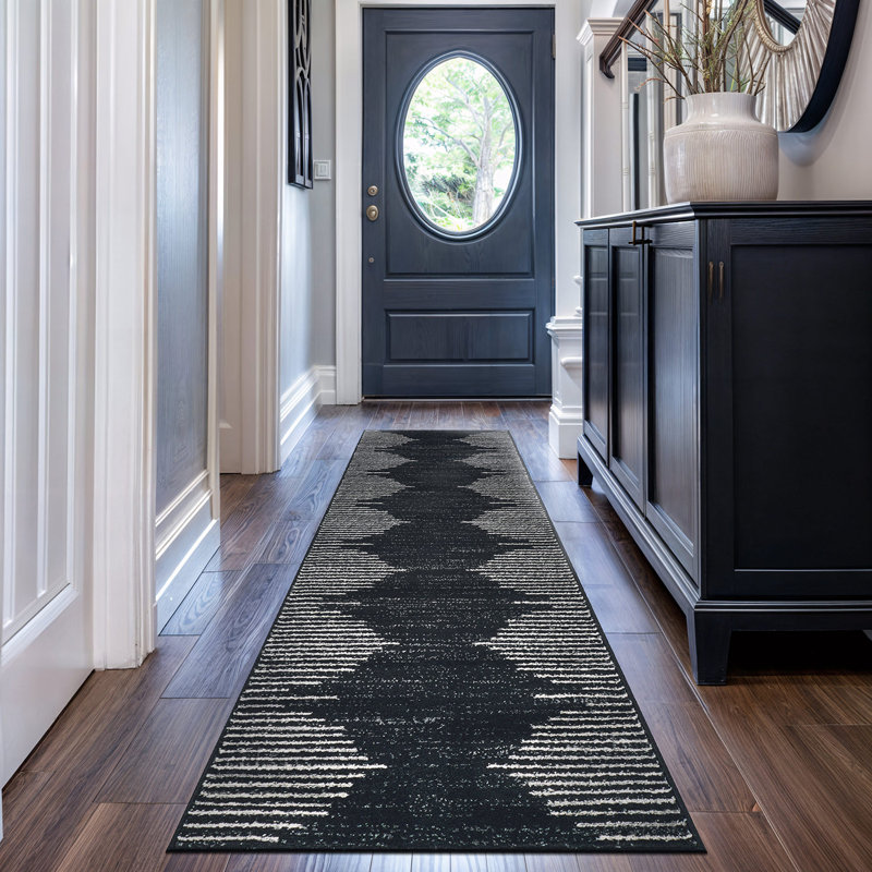 Malica Geometric Machine Woven Polypropylene Area Rug in Black/Ivory, Runner 2' x 7'